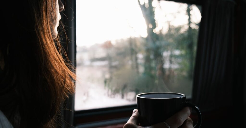 pexels-photo-17364063-17364063 A serene moment captured as a woman savors her coffee by the window, soaking in the morning light.