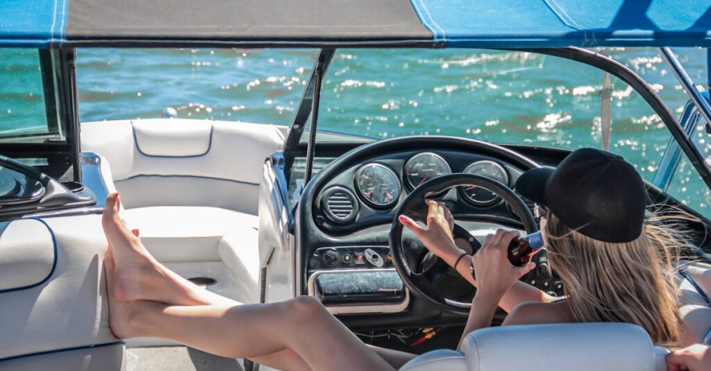 pexels-photo-209978-209978 A woman enjoys a sunny day on a luxury boat, relaxing with a beverage.