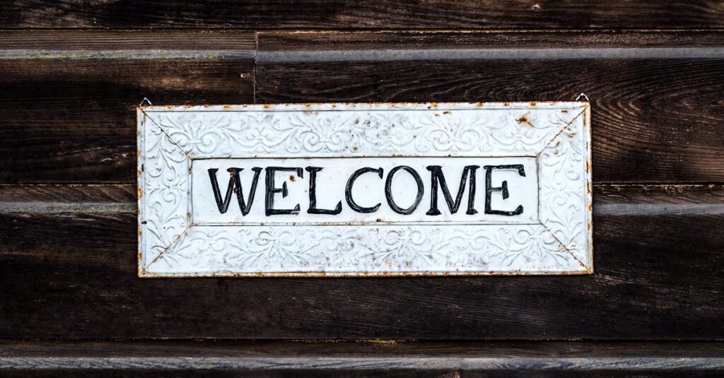 A rustic vintage-style 'Welcome' sign on a wooden wall creating a warm and inviting atmosphere.